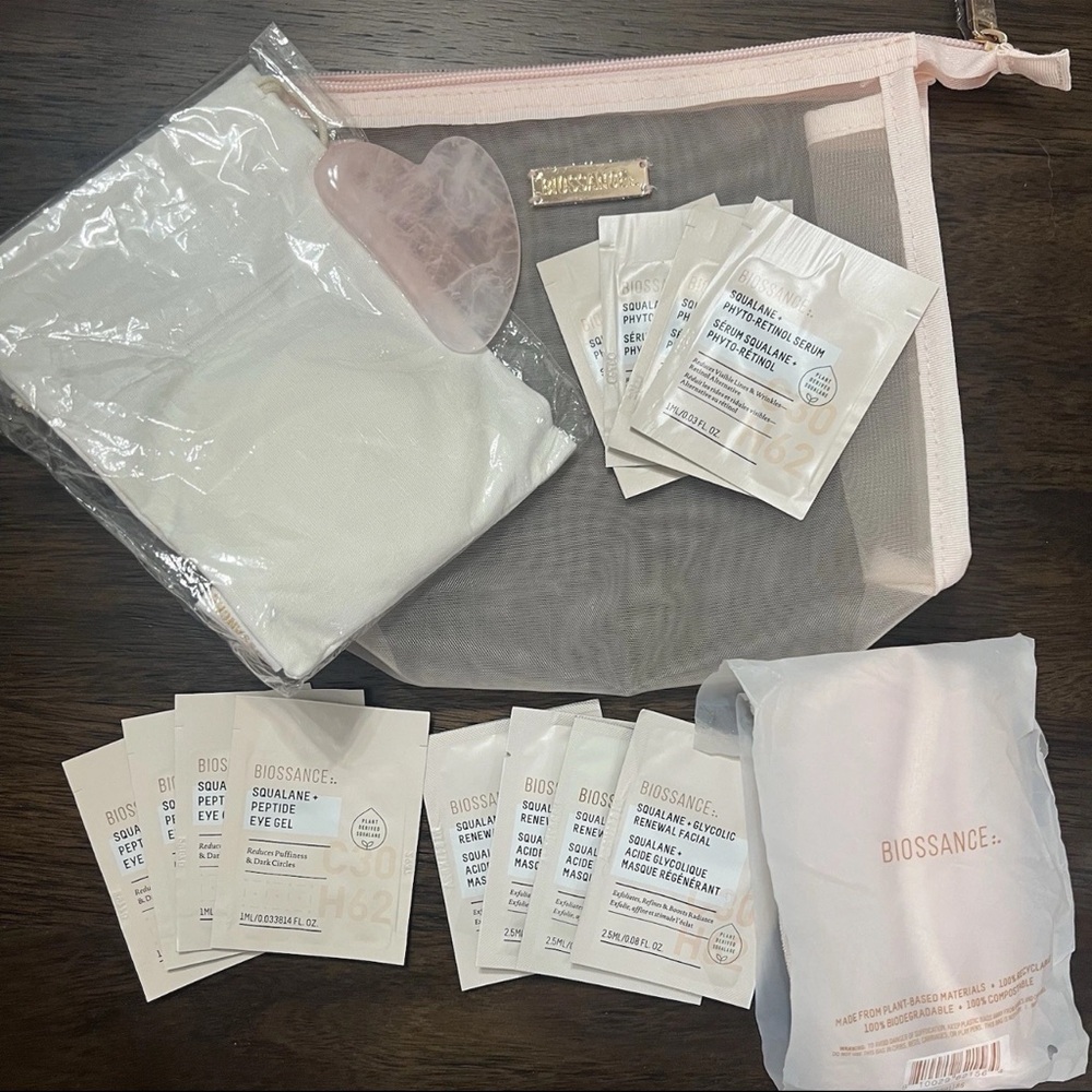 Biossance 8-piece Pink Mesh Beauty Bag Set Repair Cream, Toner, Lip Balm, etc.
